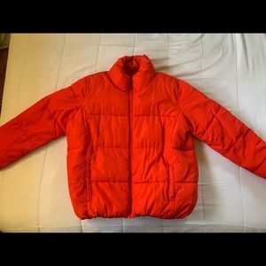 Red puffer jacket